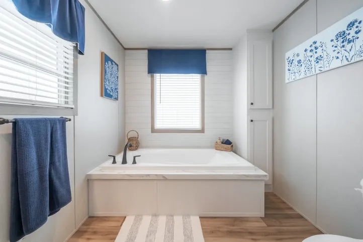 The EL SUENO BREEZE Primary Bathroom. This Manufactured Mobile Home features 4 bedrooms and 2 baths.