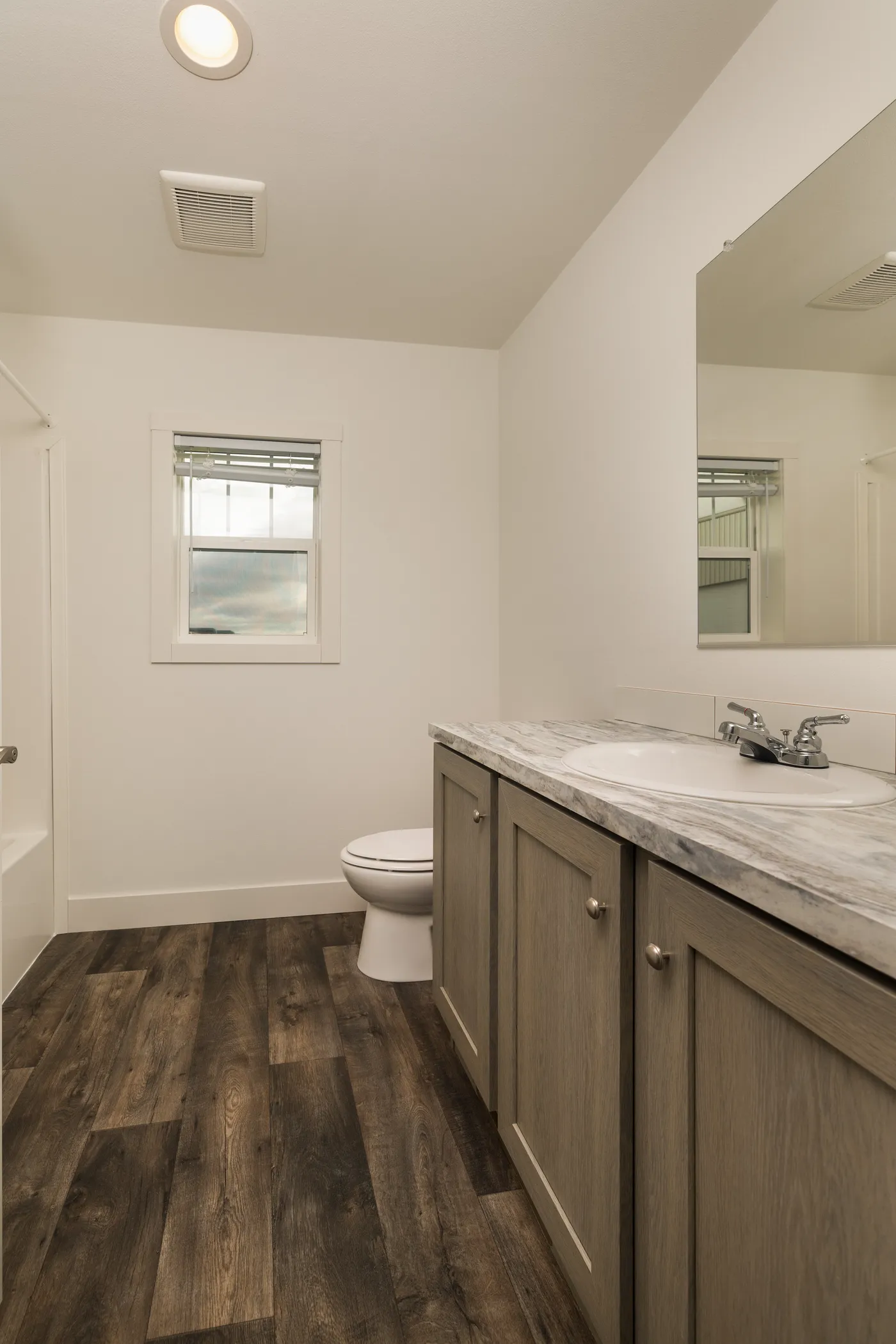 The RAMSEY 223 Guest Bathroom. This Manufactured Mobile Home features 3 bedrooms and 2 baths.