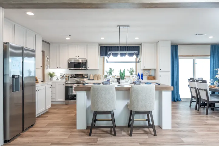 The EL SUENO BREEZE Kitchen. This Manufactured Mobile Home features 4 bedrooms and 2 baths.