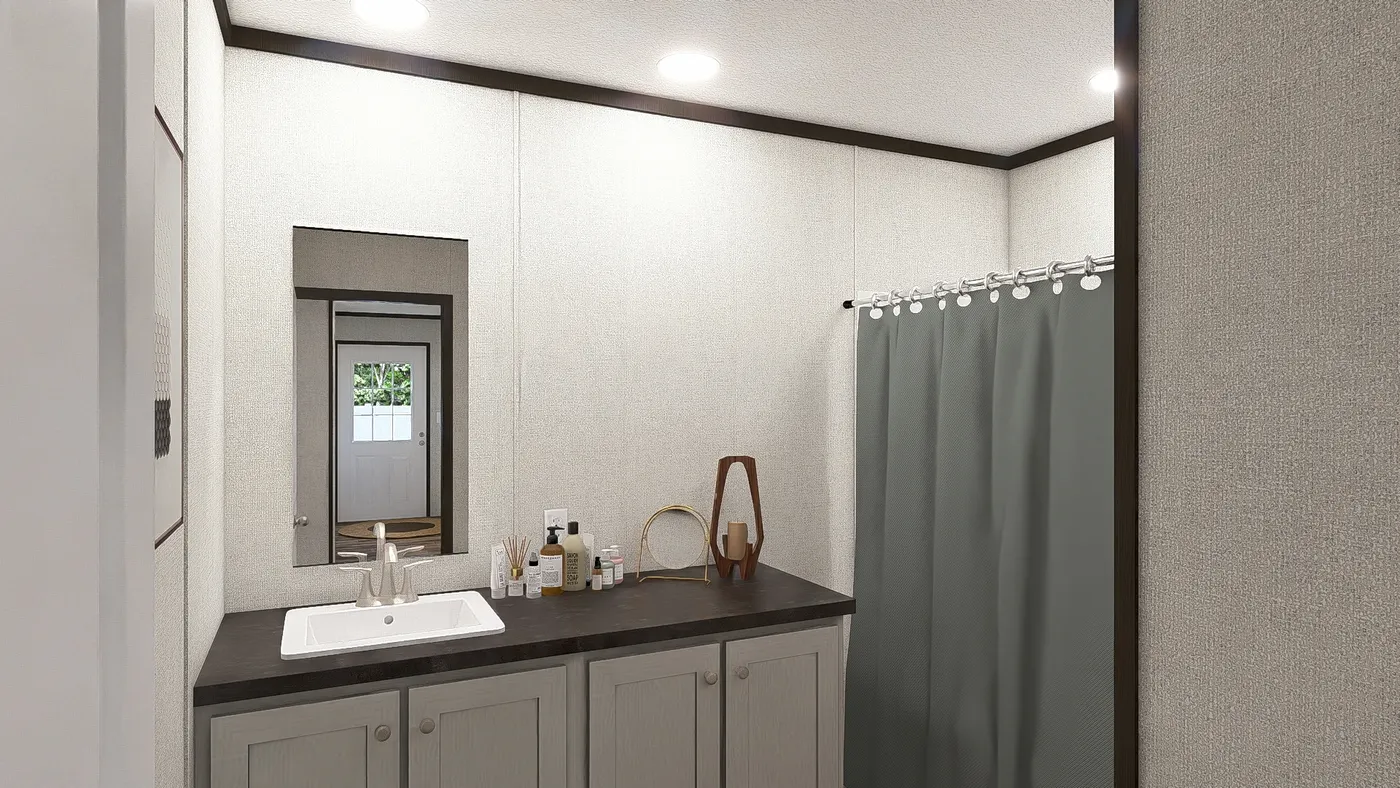 The OCCASSION Guest Bathroom. This Manufactured Mobile Home features 4 bedrooms and 2 baths.