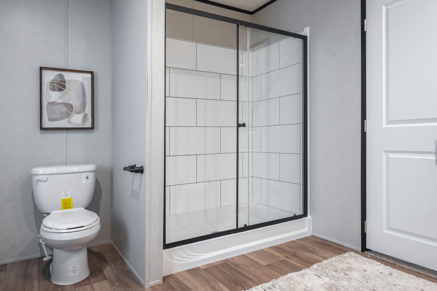 The ABSOLUTE VALUE Primary Bathroom. This Manufactured Mobile Home features 4 bedrooms and 2 baths.