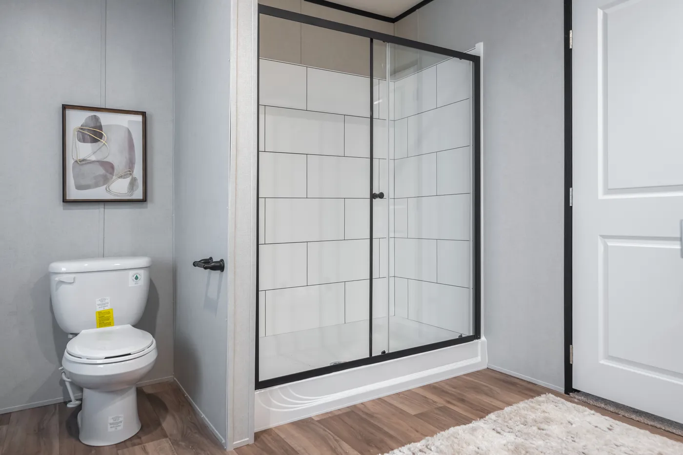 The ABSOLUTE VALUE Primary Bathroom. This Manufactured Mobile Home features 4 bedrooms and 2 baths.