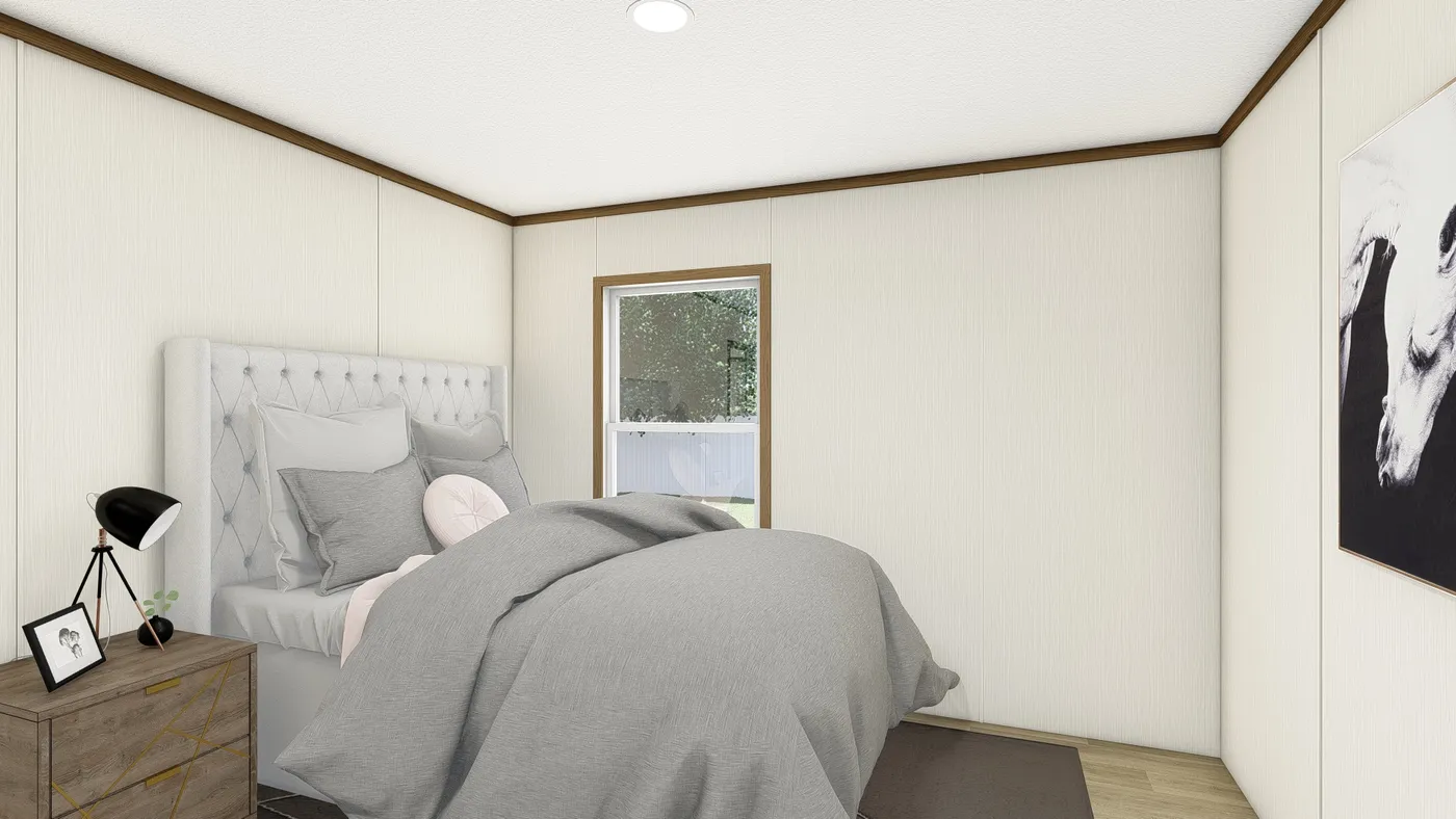 The THE EMPOWER Guest Bedroom. This Manufactured Mobile Home features 4 bedrooms and 2 baths.