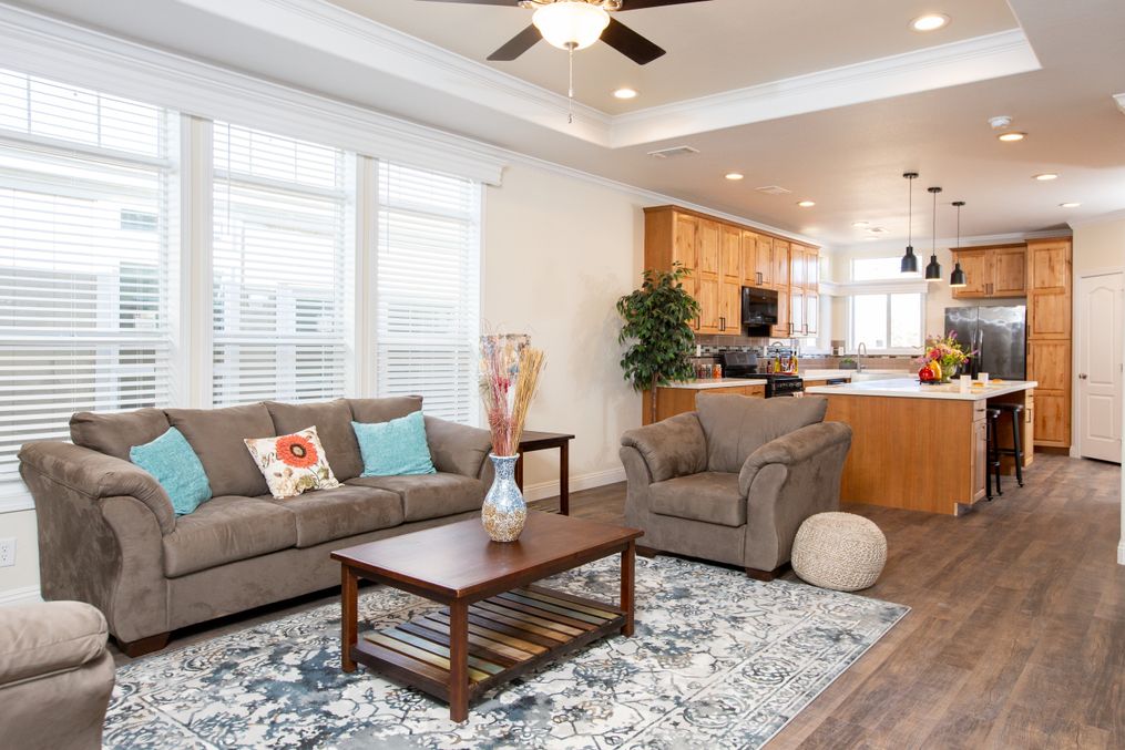 The SUM3076A Living Room. This Manufactured Mobile Home features 4 bedrooms and 2.5 baths.