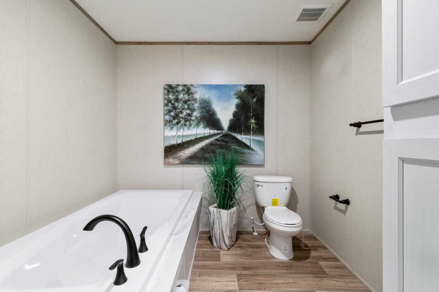 The THE CHOICE Primary Bathroom. This Manufactured Mobile Home features 4 bedrooms and 2 baths.