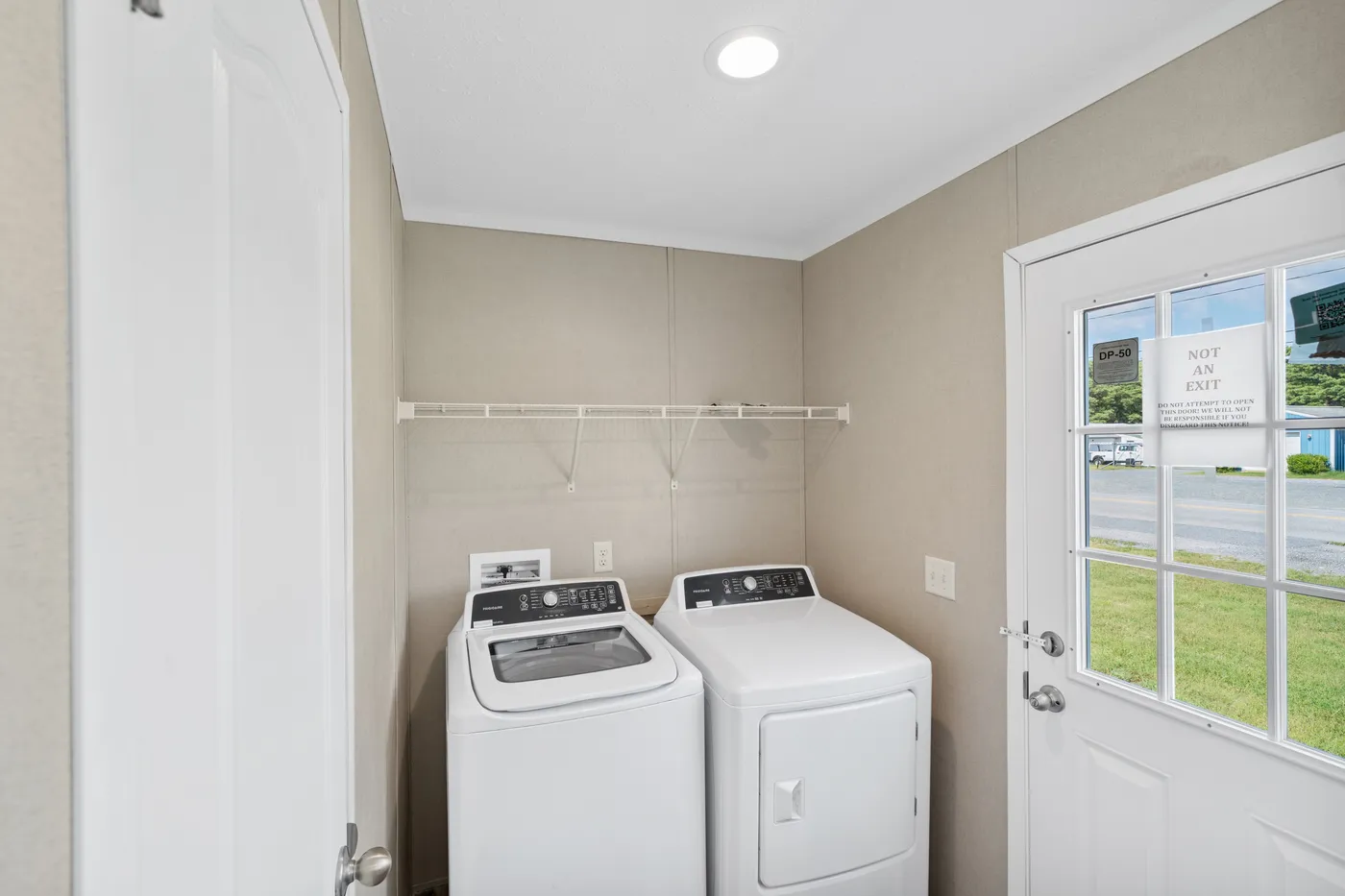 The ZIRCON Utility Room. This Manufactured Mobile Home features 3 bedrooms and 2 baths.