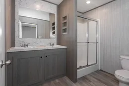 The THE SOCIAL 76 Primary Bathroom. This Manufactured Mobile Home features 3 bedrooms and 2 baths.