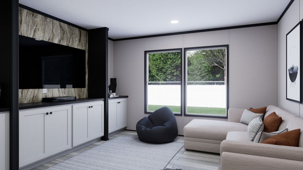 The THE MOUNTAINEER 56 Family Room. This Manufactured Mobile Home features 3 bedrooms and 2 baths.