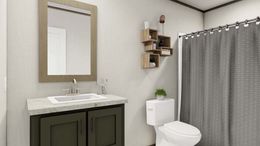 The EVEREST Guest Bathroom. This Manufactured Mobile Home features 4 bedrooms and 2 baths.