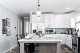 The COUNTRY AIRE Kitchen. This Manufactured Mobile Home features 3 bedrooms and 3 baths.