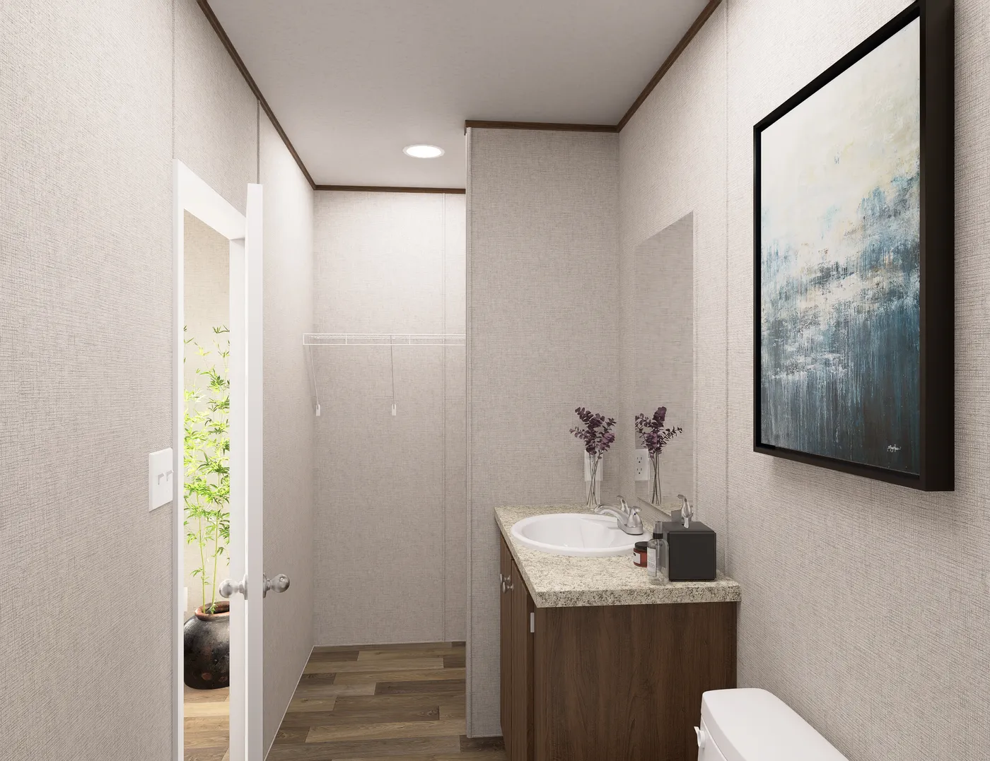 The DOGWOOD Primary Bathroom. This Manufactured Mobile Home features 2 bedrooms and 2 baths.