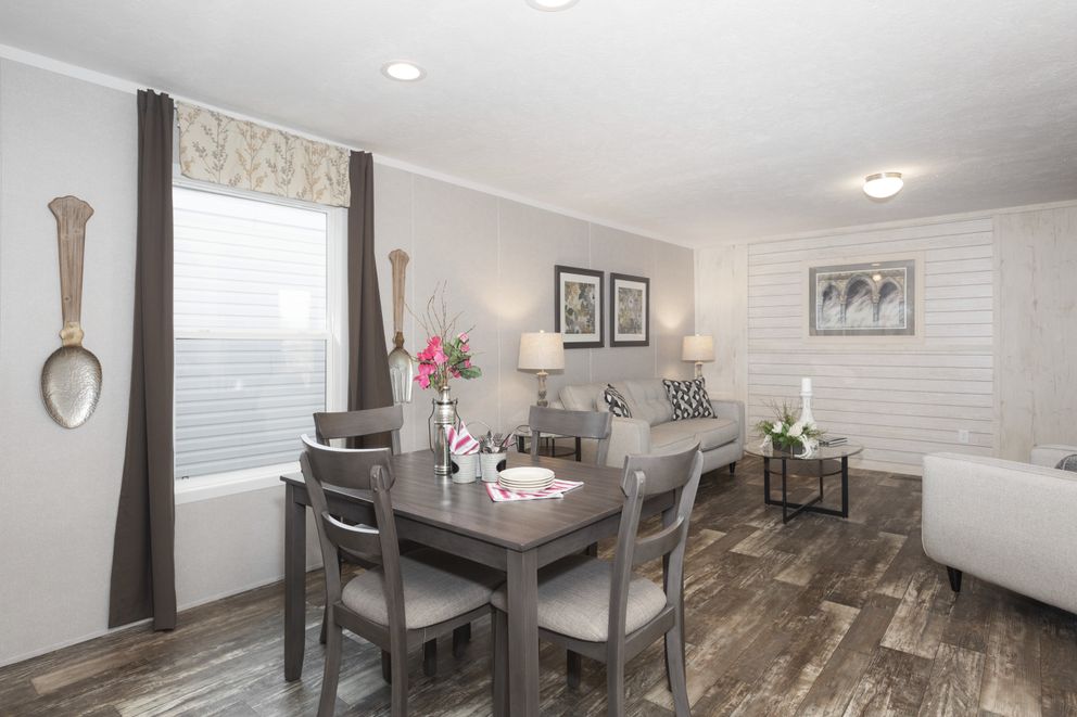 The SAPPHIRE Dining Room. This Manufactured Mobile Home features 3 bedrooms and 2 baths.