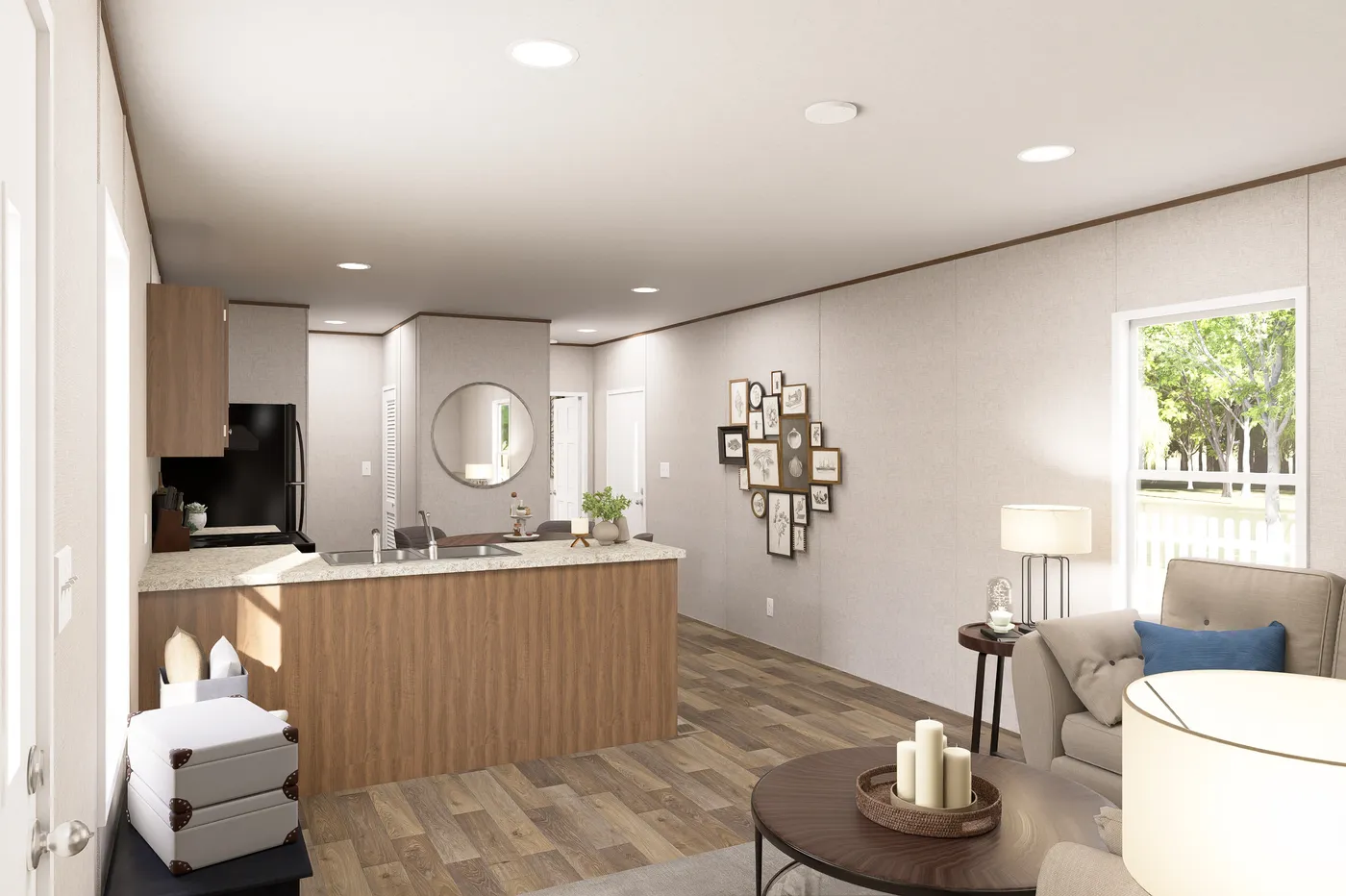 The HICKORY Living Room. This Manufactured Mobile Home features 3 bedrooms and 2 baths.