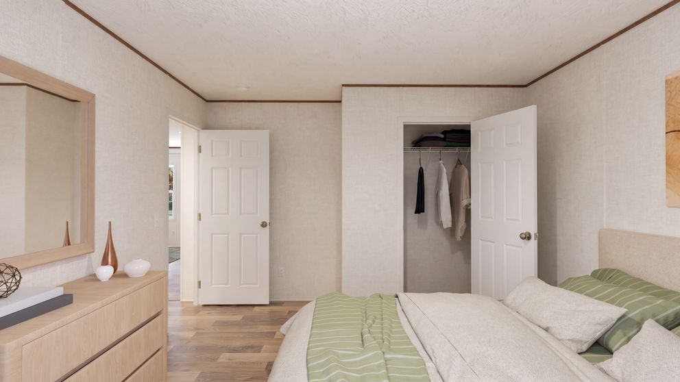 The REDWOOD Bedroom. This Manufactured Mobile Home features 5 bedrooms and 3 baths.