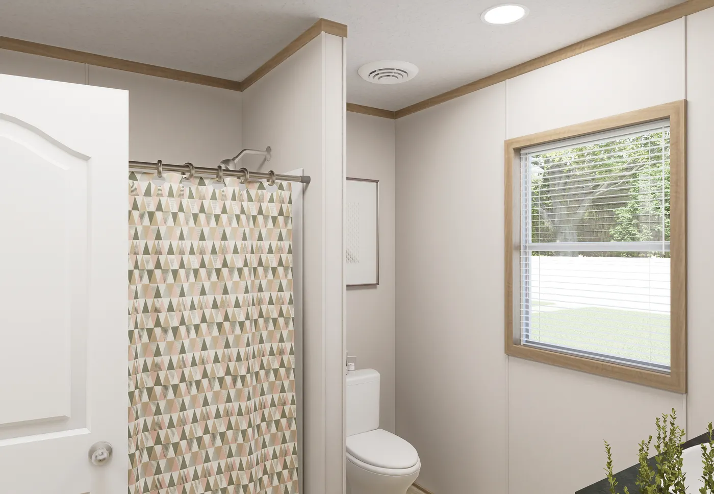 The THE MOUNTAINEER 72 Guest Bathroom. This Manufactured Mobile Home features 3 bedrooms and 2 baths.