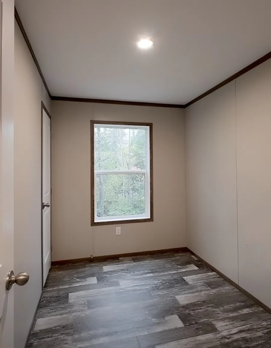 The PERIDOT Guest Bedroom. This Manufactured Mobile Home features 2 bedrooms and 1 bath.