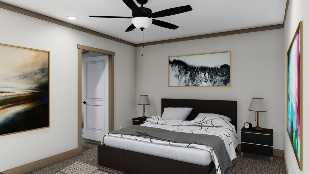 The ANNIE Primary Bedroom. This Manufactured Mobile Home features 3 bedrooms and 2 baths.
