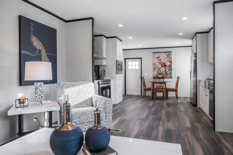The LIL SOUTHERN CHARM Kitchen. This Manufactured Mobile Home features 3 bedrooms and 2 baths.
