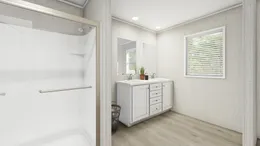 The COASTAL BREEZE II 28X56 Primary Bathroom. This Manufactured Mobile Home features 3 bedrooms and 2 baths.