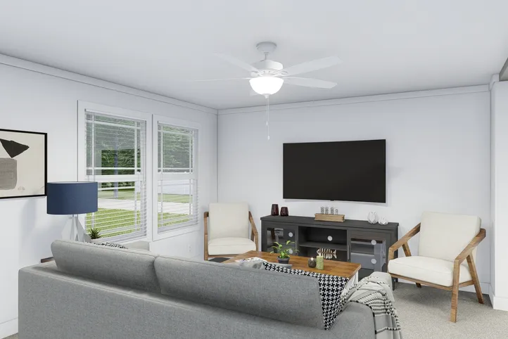 The CLASSIC 56D Living Room. This Manufactured Mobile Home features 3 bedrooms and 2 baths.