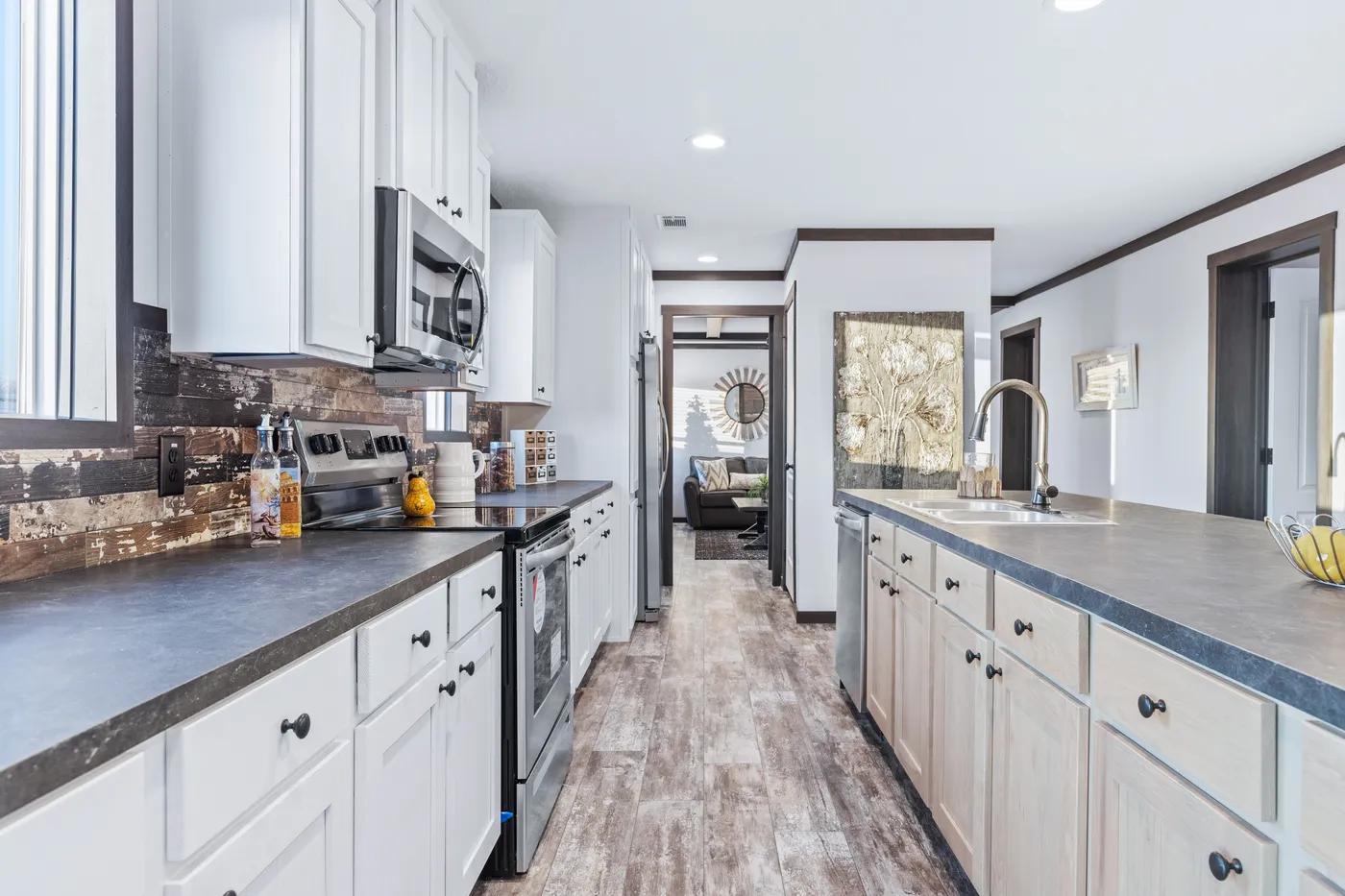 The BOUJEE XL Kitchen. This Manufactured Mobile Home features 4 bedrooms and 3 baths.