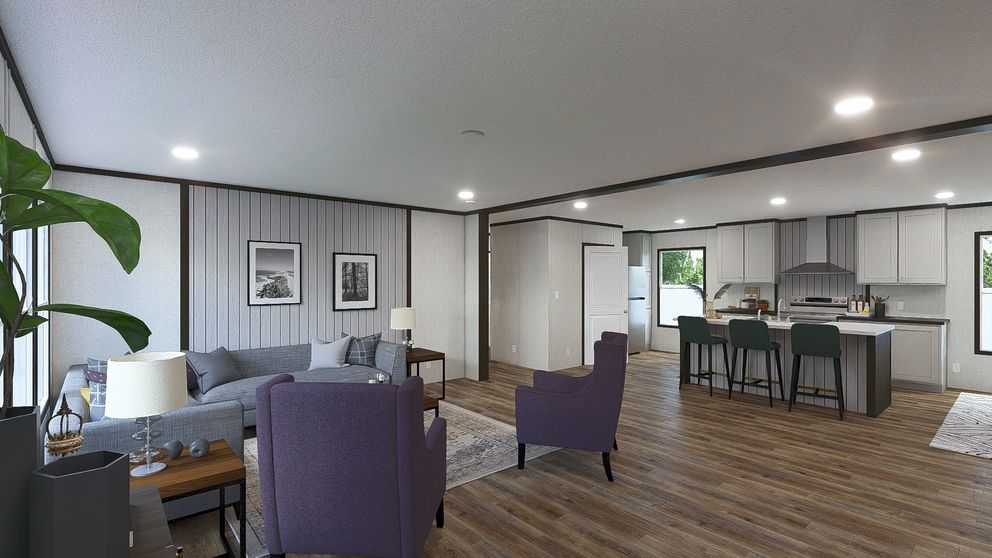 The EMPOWER Living Room. This Manufactured Mobile Home features 4 bedrooms and 2 baths.