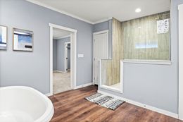 The THE OCEANSIDE Master Bathroom. This Manufactured Mobile Home features 4 bedrooms and 3 baths.