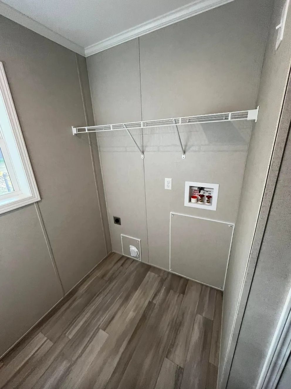 The PERIDOT 60 Utility Room. This Manufactured Mobile Home features 2 bedrooms and 2 baths.