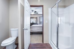 The BREEZE FARMHOUSE Primary Bathroom. This Manufactured Mobile Home features 3 bedrooms and 2 baths.