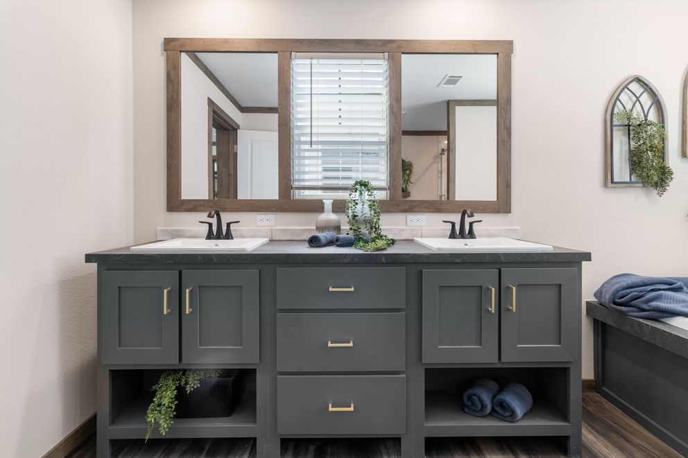 The FARM 4 FLEX Primary Bathroom. This Manufactured Mobile Home features 4 bedrooms and 3 baths.