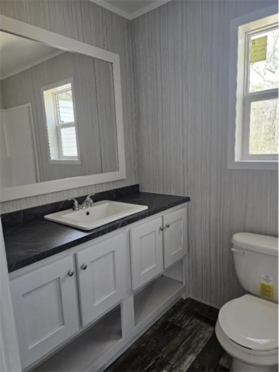 The TOPAZ Primary Bathroom. This Manufactured Mobile Home features 3 bedrooms and 2 baths.
