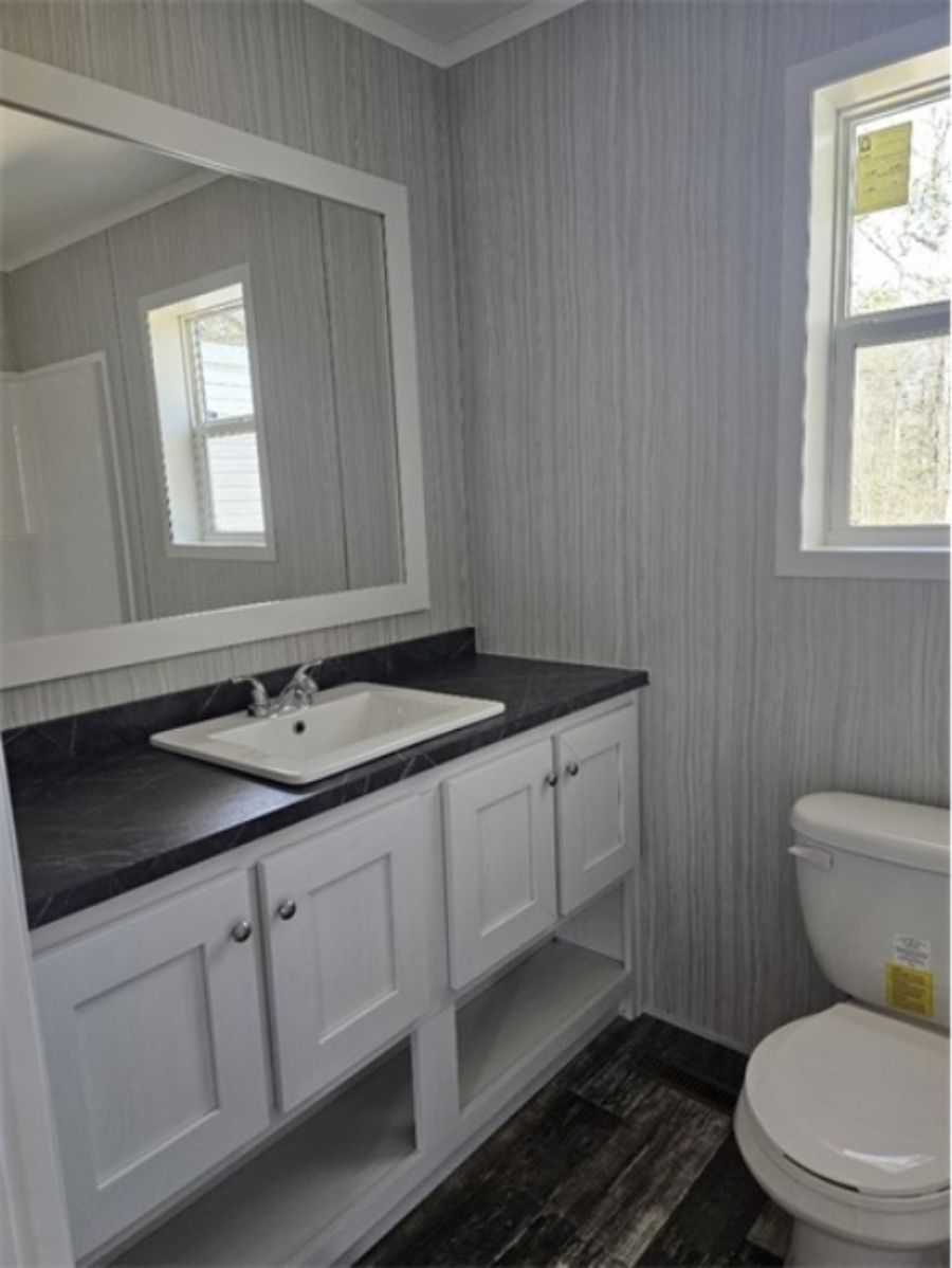 The TOPAZ Primary Bathroom. This Manufactured Mobile Home features 3 bedrooms and 2 baths.