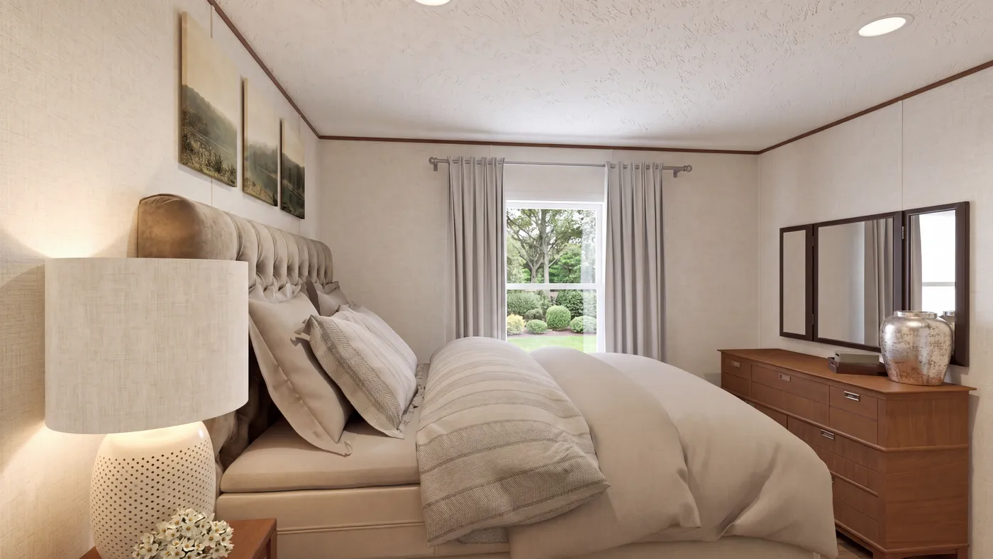The ELM Primary Bedroom. This Manufactured Mobile Home features 2 bedrooms and 1 bath.