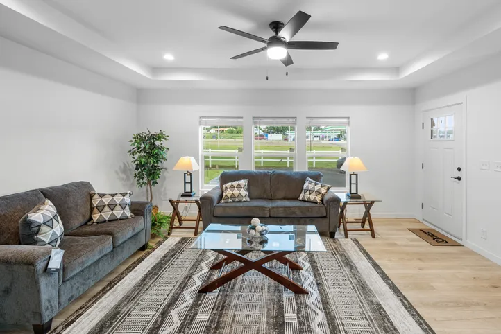 The LULAMAE 3 Living Room. This Manufactured Mobile Home features 3 bedrooms and 2 baths.