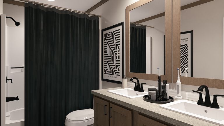The LIZZIE ELITE Guest Bathroom. This Manufactured Mobile Home features 3 bedrooms and 2 baths.