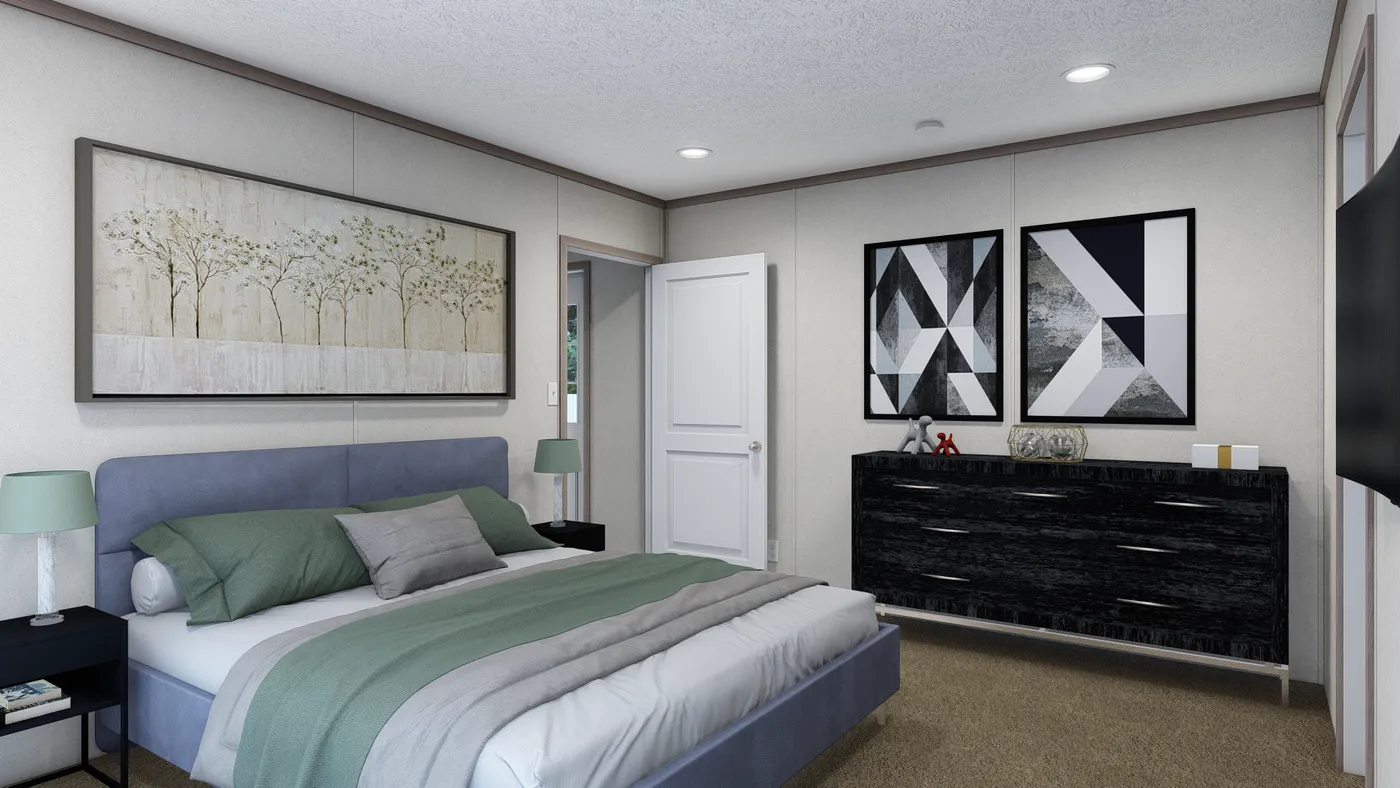The 6616-4772P THE PULSE Primary Bedroom. This Manufactured Mobile Home features 2 bedrooms and 2 baths.