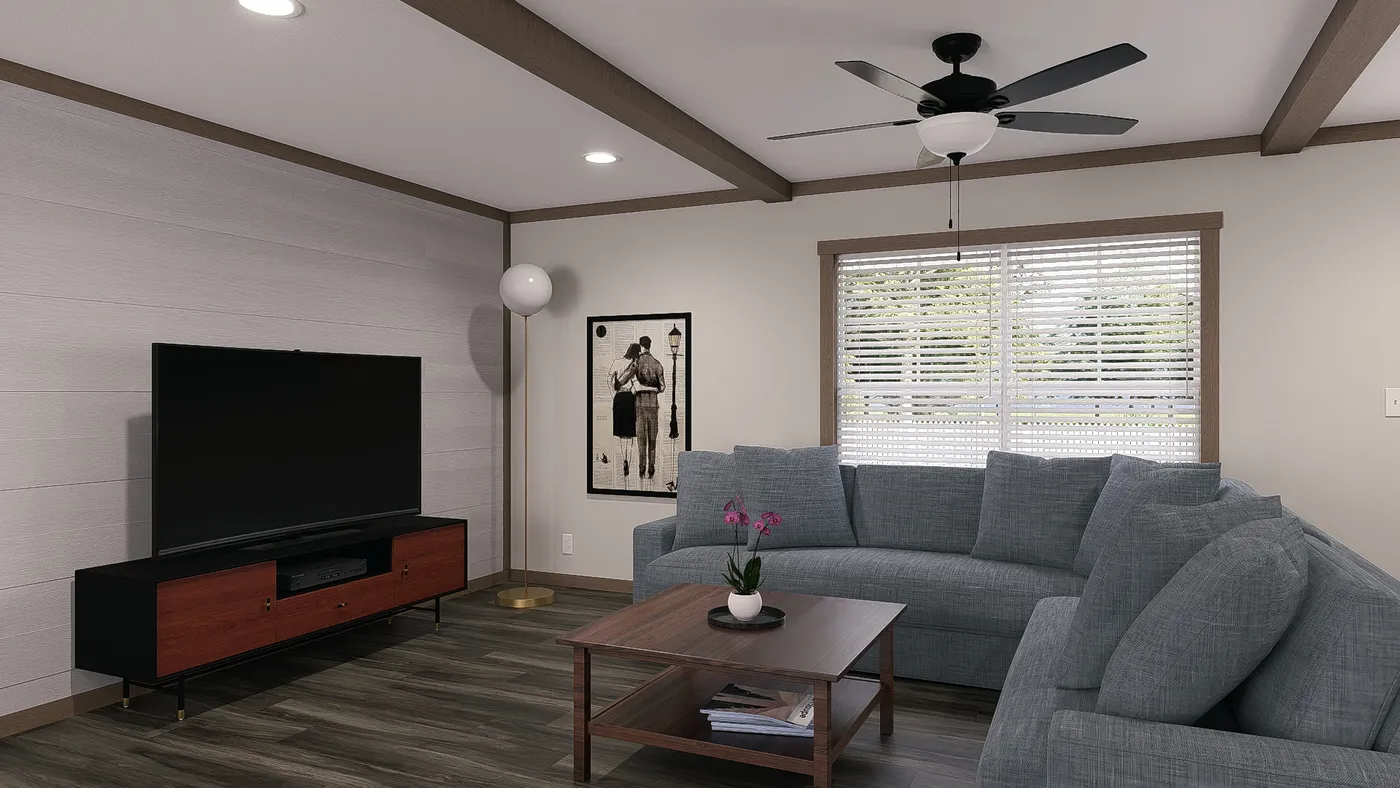 The EVERETT Living Room. This Manufactured Mobile Home features 4 bedrooms and 3 baths.