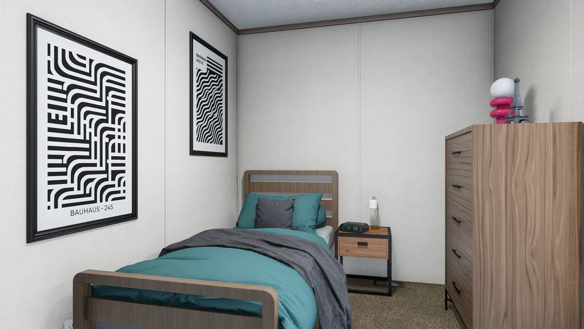 The 5614-4701 THE PULSE Guest Bedroom. This Manufactured Mobile Home features 2 bedrooms and 1 bath.