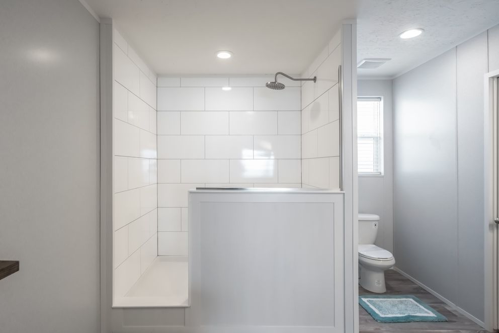 The THE FUSION 32B Primary Bathroom. This Manufactured Mobile Home features 4 bedrooms and 2 baths.