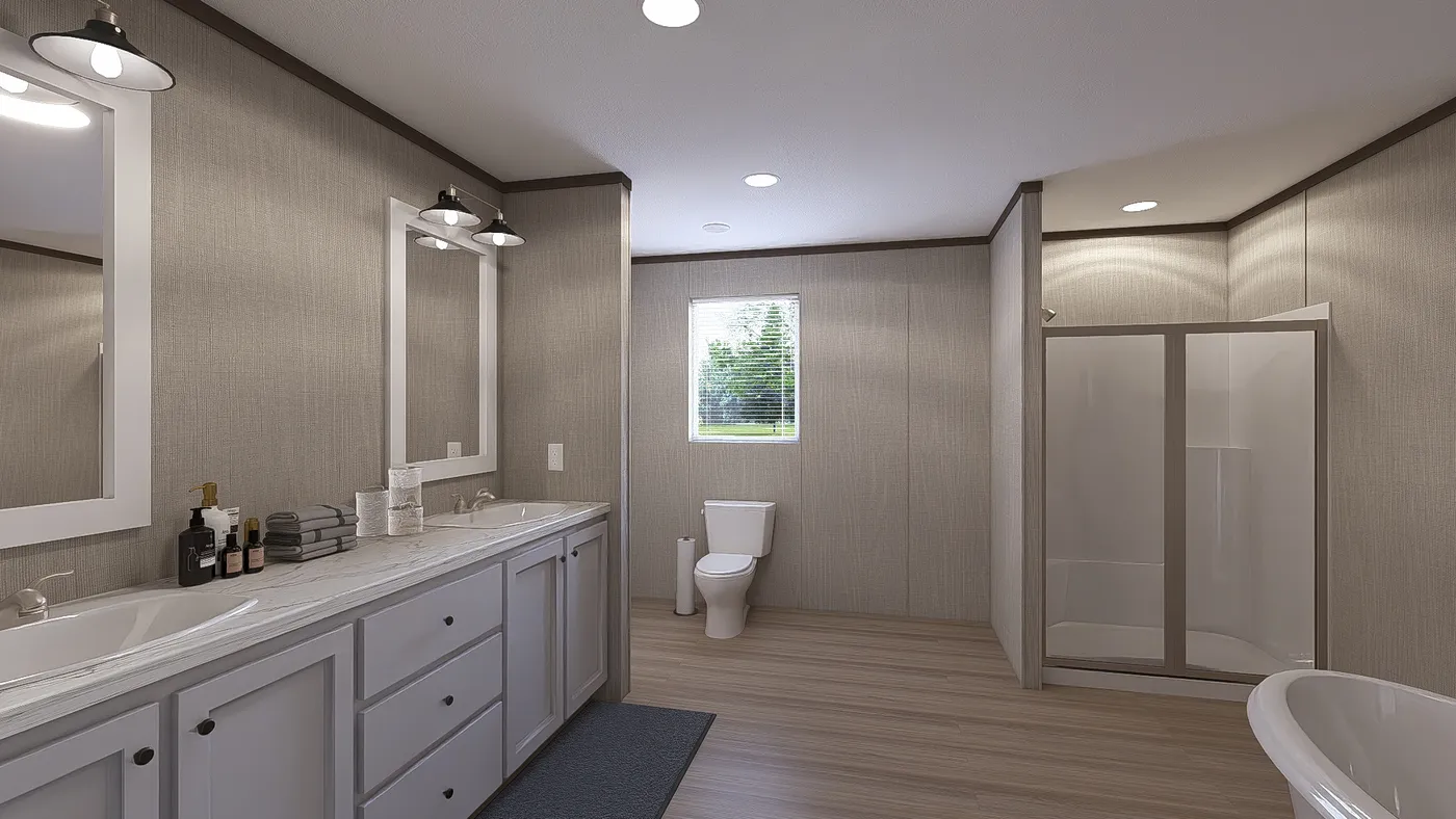 The THE RESERVE 60 Primary Bathroom. This Manufactured Mobile Home features 3 bedrooms and 2 baths.