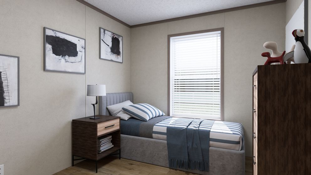 The 5628-CC52 COMPASS 56 Guest Bedroom. This Manufactured Mobile Home features 3 bedrooms and 2 baths.