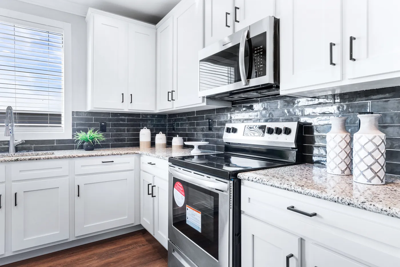 The THE FUJI Kitchen. This Manufactured Mobile Home features 4 bedrooms and 3 baths.