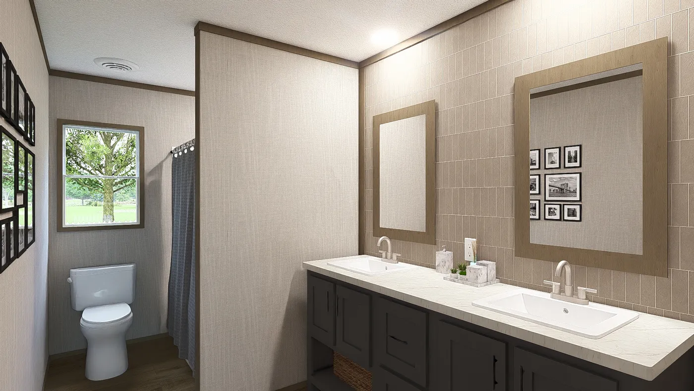 The DRAKE Primary Bathroom. This Manufactured Mobile Home features 3 bedrooms and 2 baths.