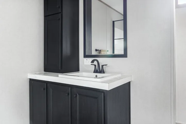 The STERLING XL ANNIVERSARY Primary Bathroom. This Manufactured Mobile Home features 3 bedrooms and 2 baths.