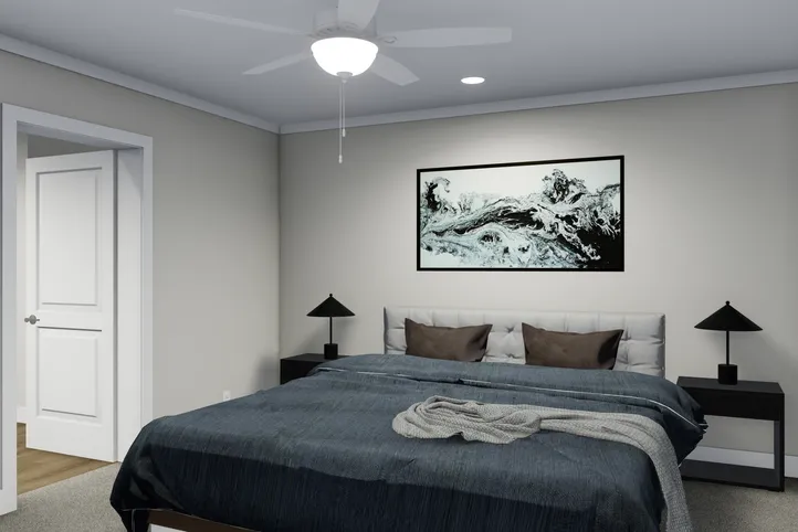 The CLASSIC 60B Primary Bedroom. This Manufactured Mobile Home features 3 bedrooms and 2 baths.