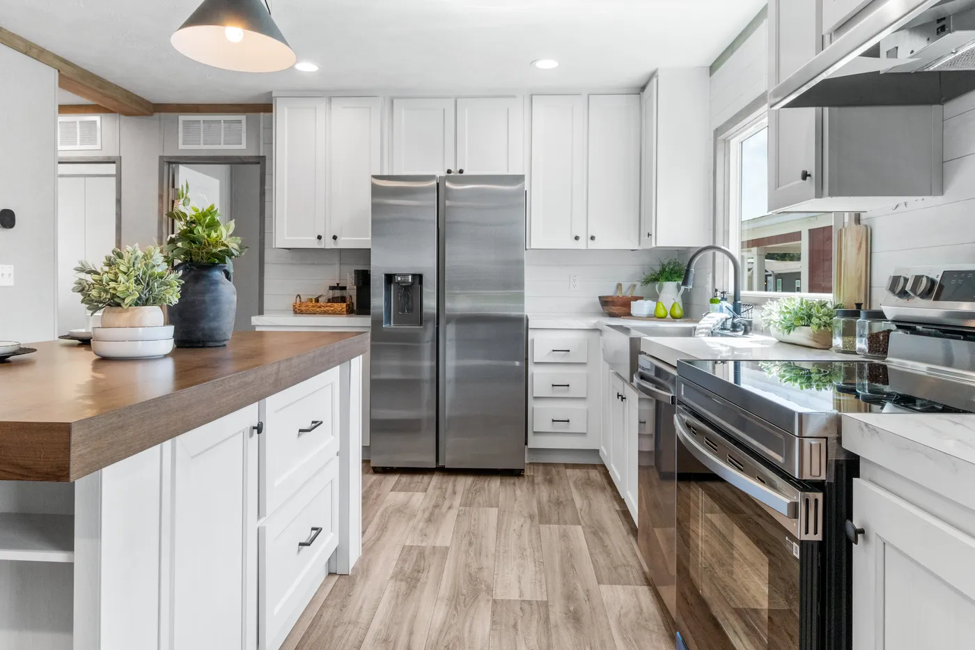 The THE REAL DEAL Kitchen. This Manufactured Mobile Home features 3 bedrooms and 2 baths.