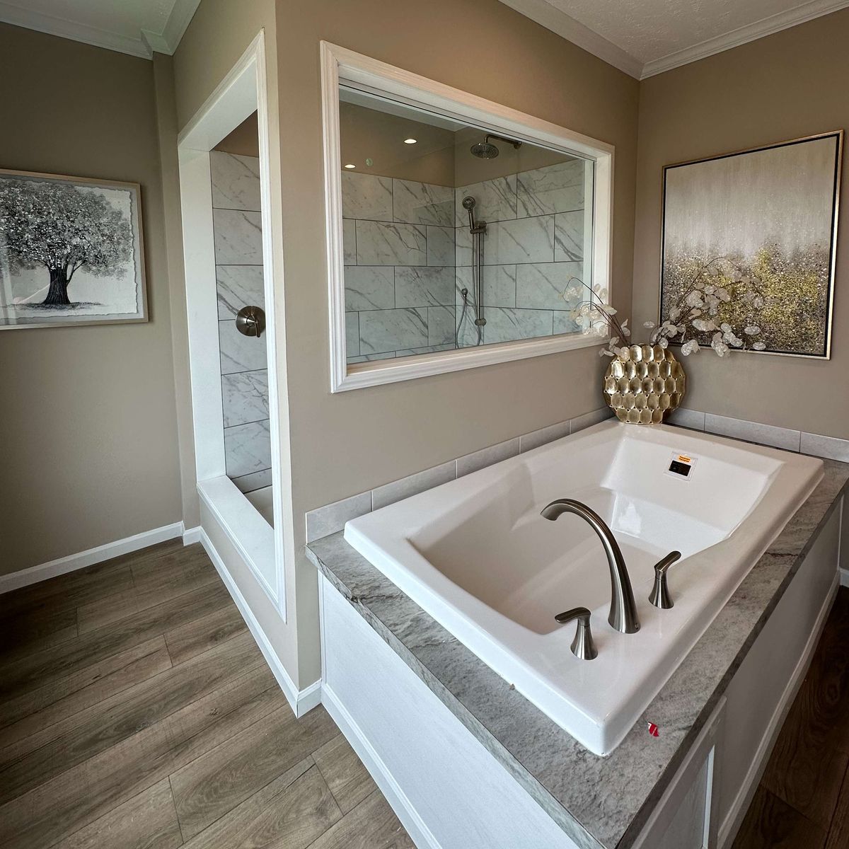 The THE HEXAGON Primary Bathroom. This Manufactured Mobile Home features 4 bedrooms and 3 baths.
