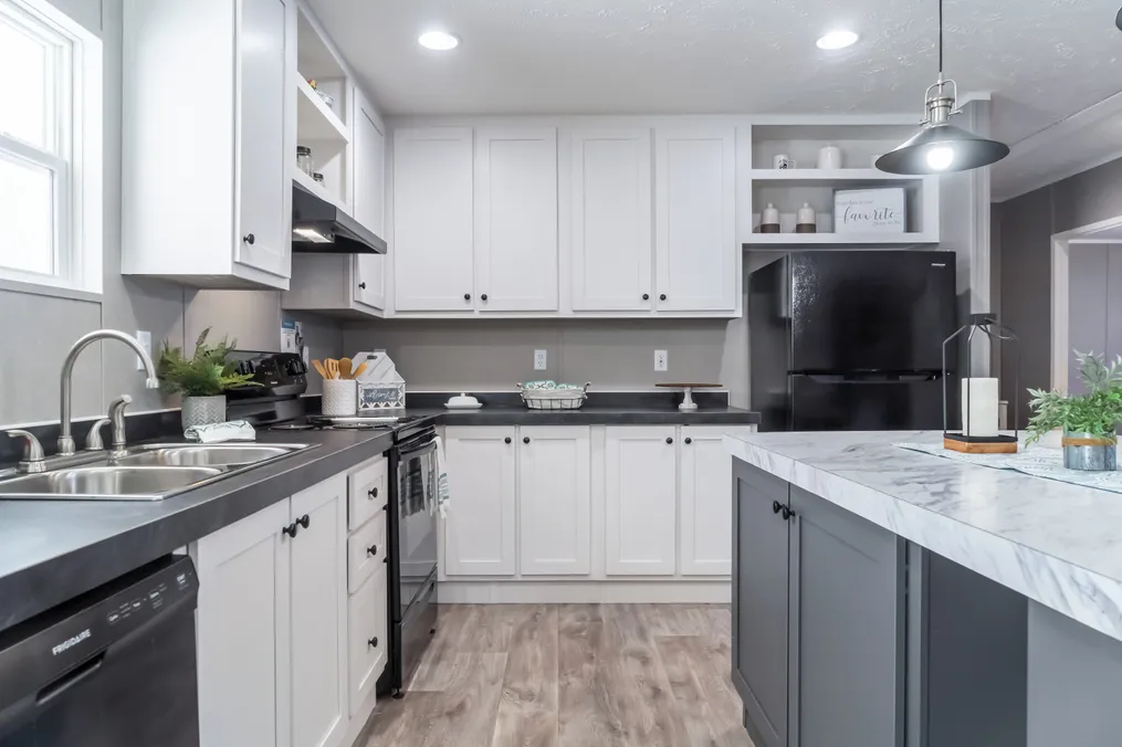 The TRADITION 52B Kitchen. This Manufactured Mobile Home features 3 bedrooms and 2 baths.