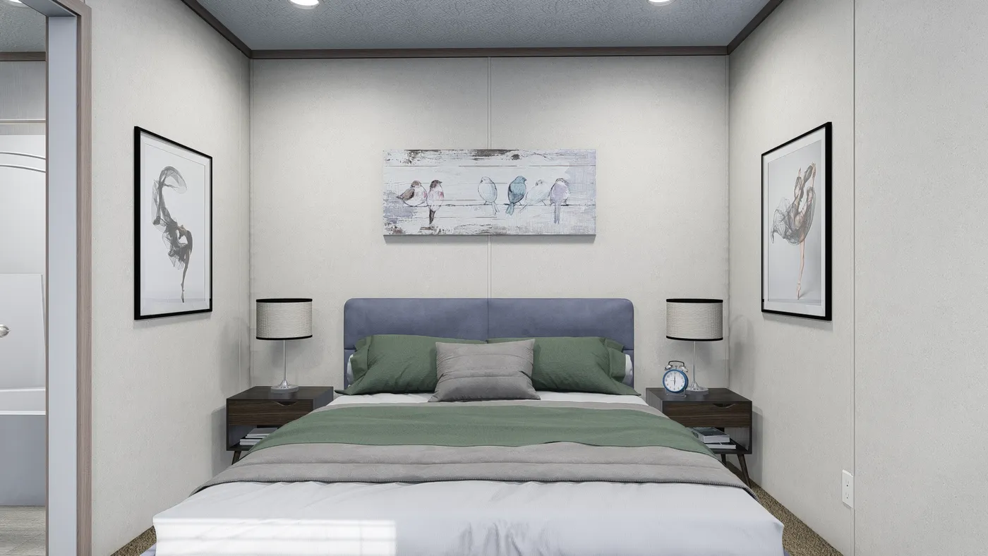 The 6614-4701 THE PULSE Primary Bedroom. This Manufactured Mobile Home features 3 bedrooms and 2 baths.