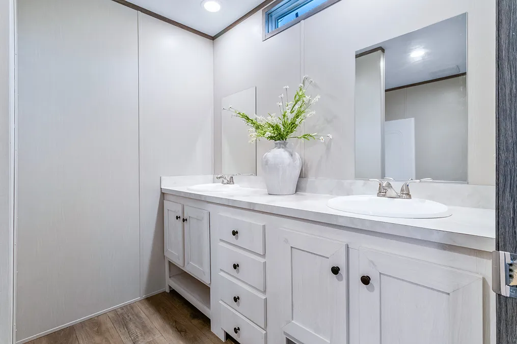 The SELECT 16723F Primary Bathroom. This Manufactured Mobile Home features 3 bedrooms and 2 baths.